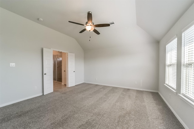 interior space with ceiling fan and vaulted ceiling