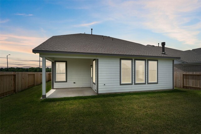 344 Spruce Oak Ln, Waller, TX 77484 - back of property featuring a patio and roof with shingles
