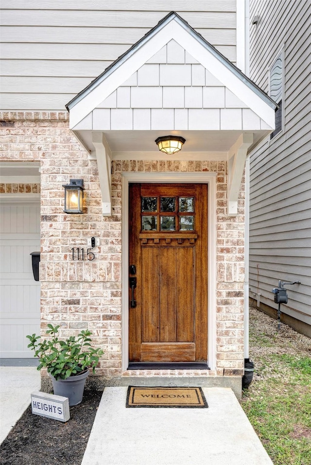 property entrance featuring a garage