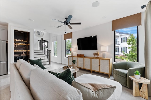 living room featuring ceiling fan