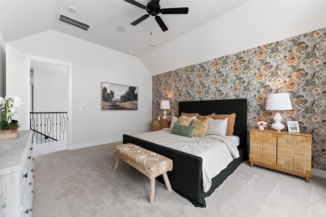 carpeted bedroom featuring ceiling fan and lofted ceiling