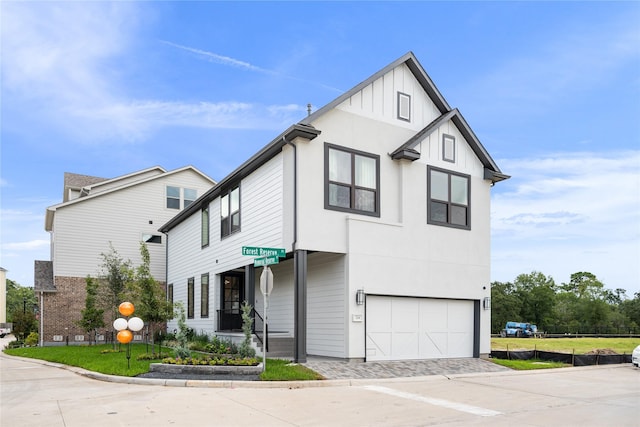 view of front of property with a garage