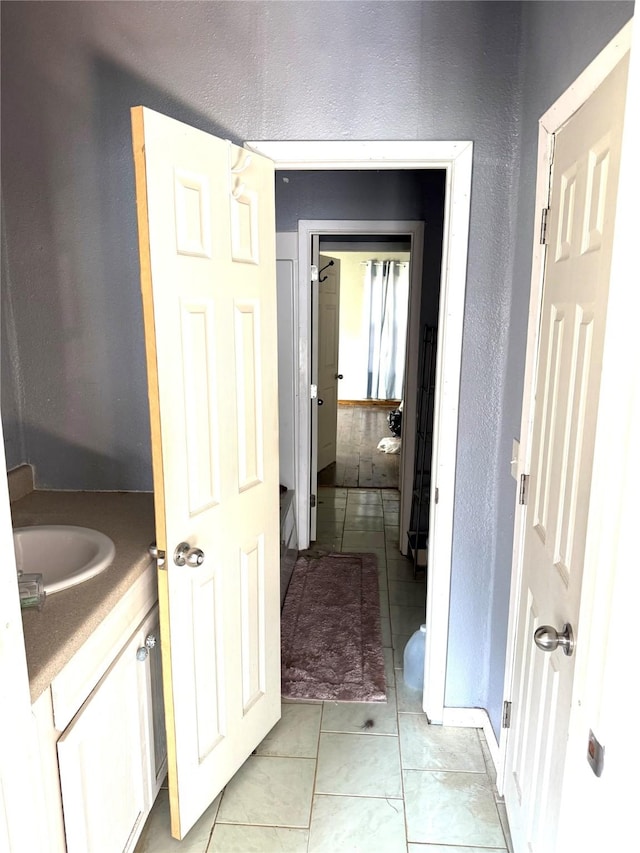 bathroom featuring vanity and tile patterned floors