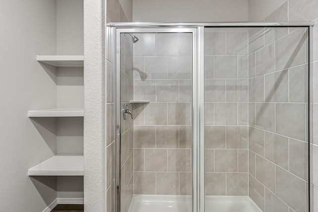 bathroom featuring walk in shower