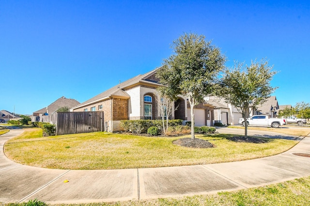 view of front of home with a front yard