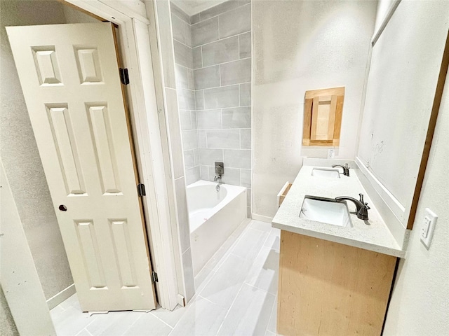 bathroom with tile patterned floors and vanity