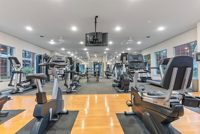 gym featuring light wood-type flooring