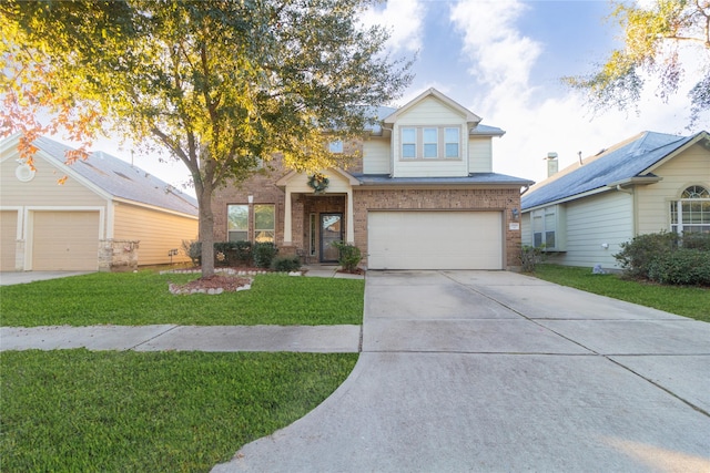 view of front of home with a front yard and a garage