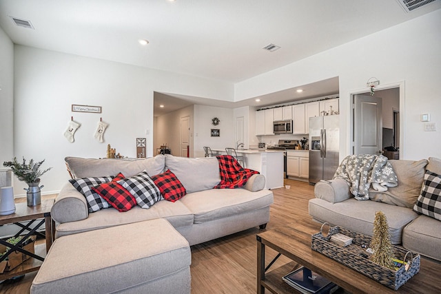 living room featuring light hardwood / wood-style flooring