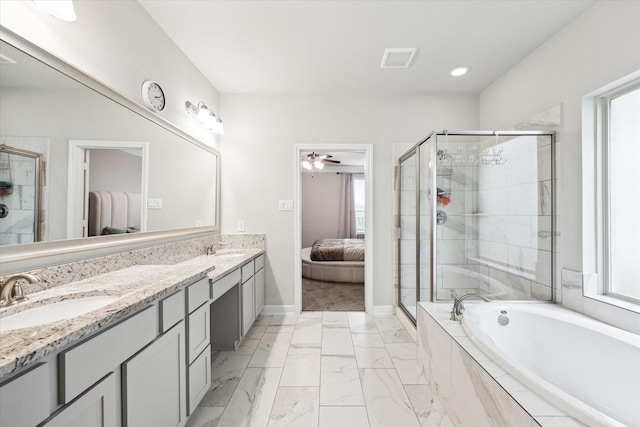 bathroom featuring vanity, plenty of natural light, independent shower and bath, and ceiling fan