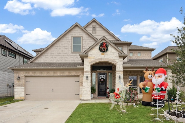 view of front facade with a front lawn and a garage