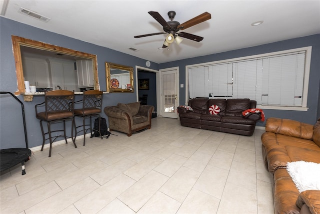 living room with ceiling fan