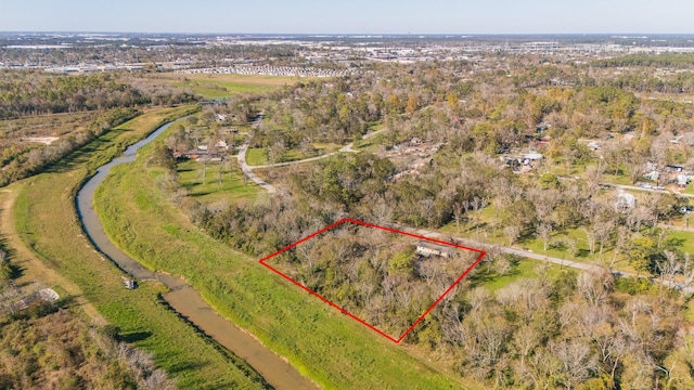 birds eye view of property featuring a rural view