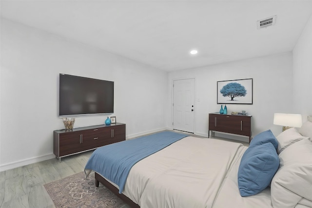 bedroom featuring light hardwood / wood-style floors