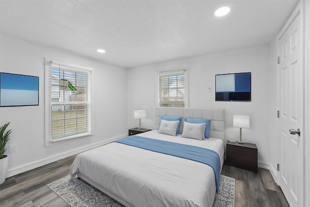 bedroom featuring dark hardwood / wood-style floors