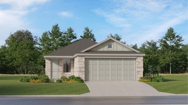 view of front of house with a front yard and a garage