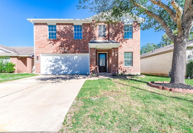 view of property with a garage and a front lawn