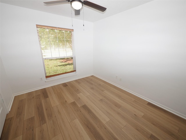 spare room with ceiling fan and light hardwood / wood-style flooring