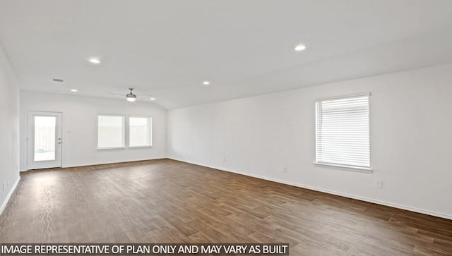 spare room featuring ceiling fan, dark hardwood / wood-style flooring, and lofted ceiling