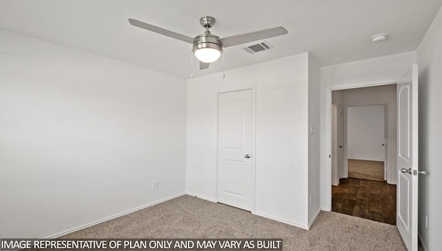 unfurnished bedroom with carpet floors, a closet, and ceiling fan