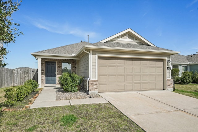 single story home featuring a garage