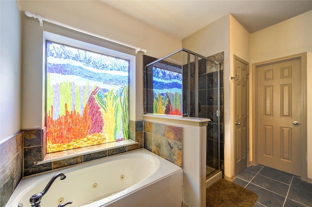 bathroom featuring independent shower and bath and tile patterned flooring