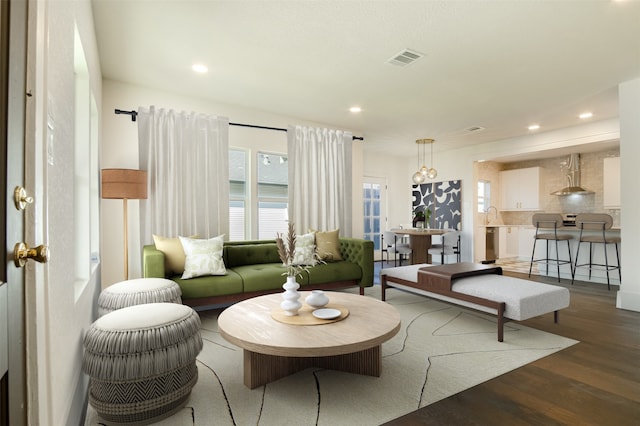 living room featuring dark hardwood / wood-style floors