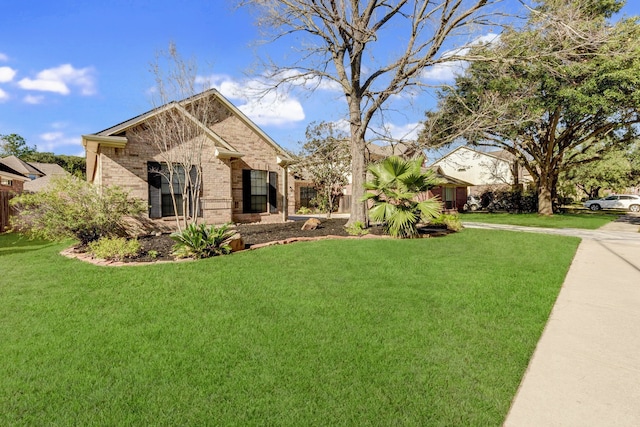 view of front of property with a front lawn