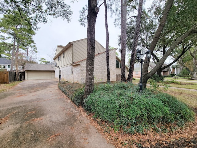 view of property exterior featuring a garage