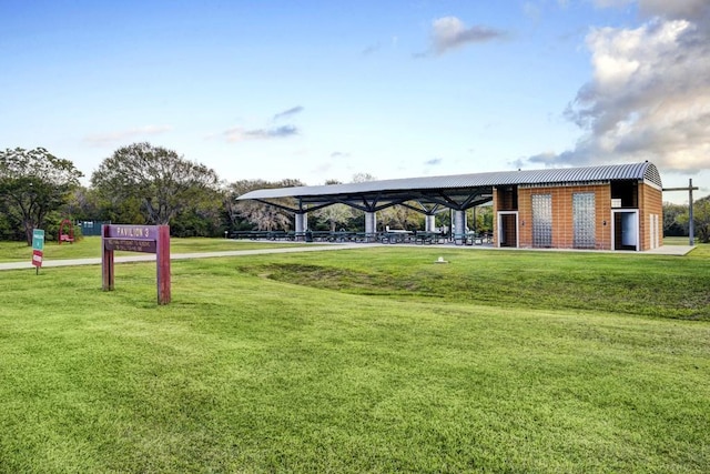 view of community featuring a yard