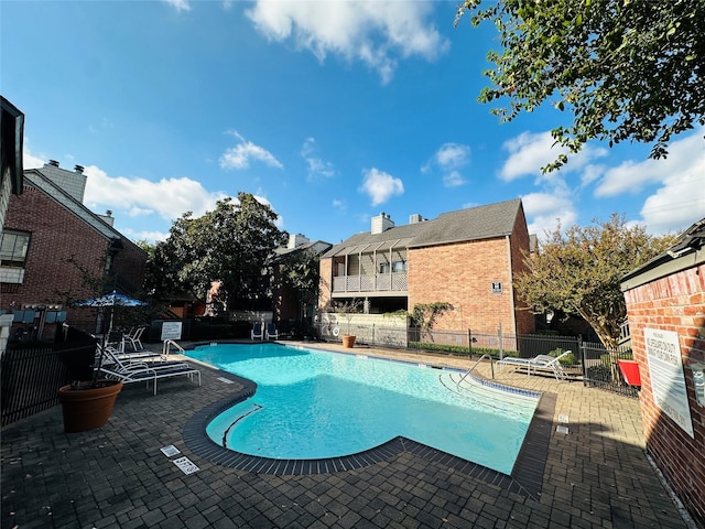 view of pool with a patio