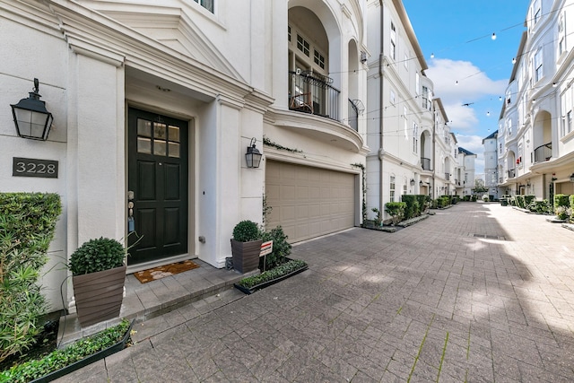 property entrance featuring a garage