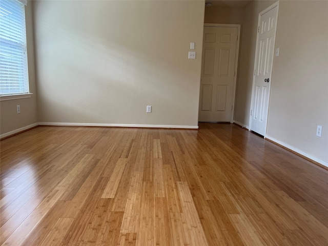 empty room with light wood-type flooring