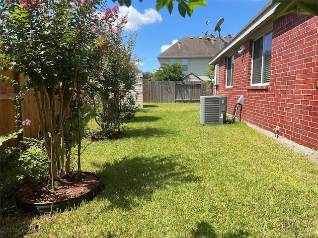 view of yard featuring central AC