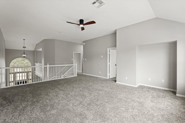 unfurnished room featuring carpet, ceiling fan, and lofted ceiling