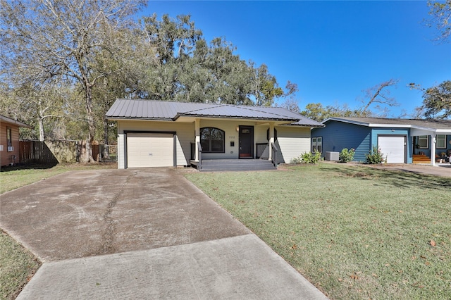 ranch-style house with a porch, a garage, a front yard, and central AC