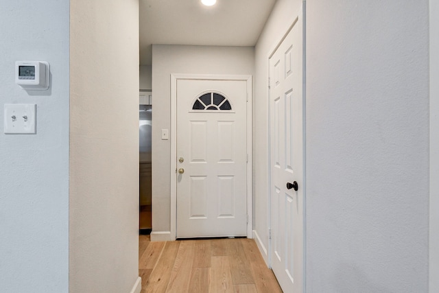 entryway with light wood-type flooring