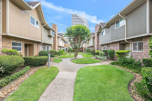 view of community with a yard