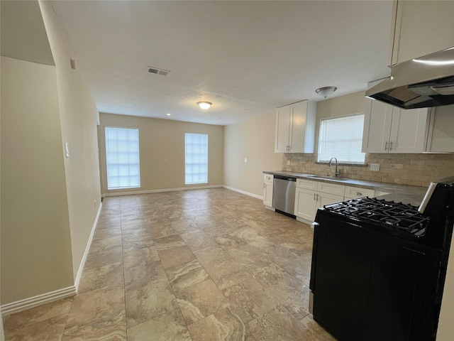 kitchen featuring gas stove, white cabinetry, sink, stainless steel dishwasher, and island range hood