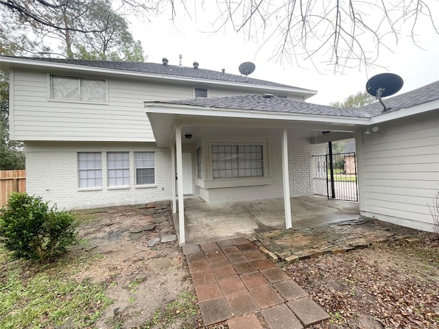 rear view of house with a patio