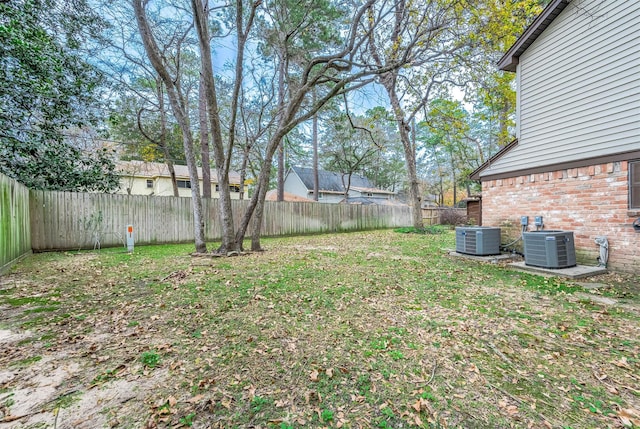 view of yard with central AC unit