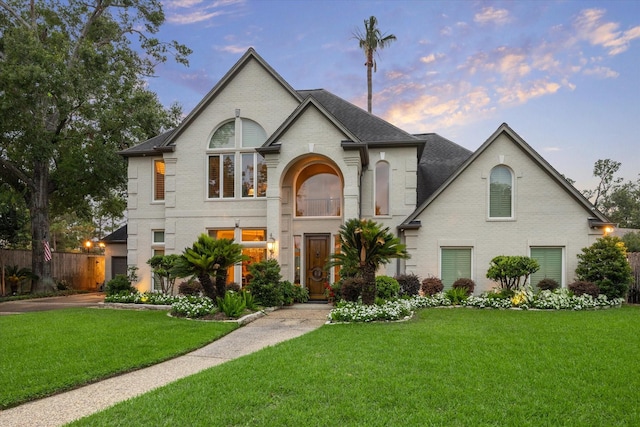 view of front of house with a lawn