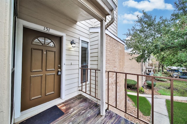 entrance to property with covered porch