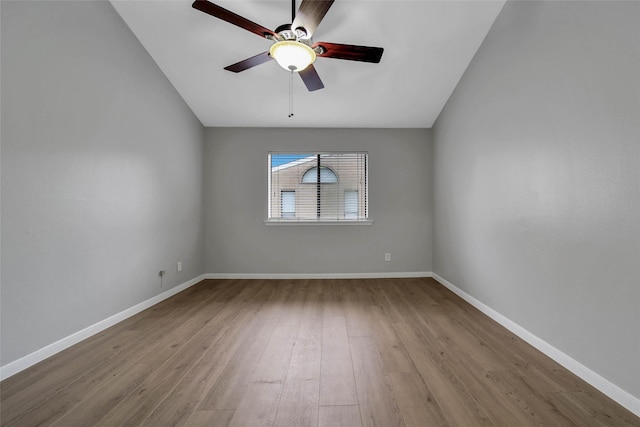 empty room with light hardwood / wood-style flooring and ceiling fan