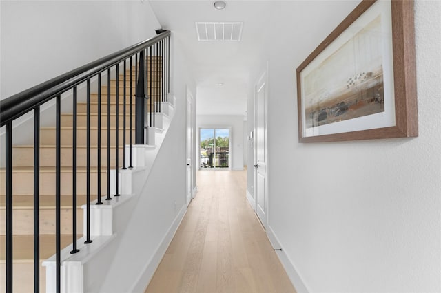 hall featuring light hardwood / wood-style flooring