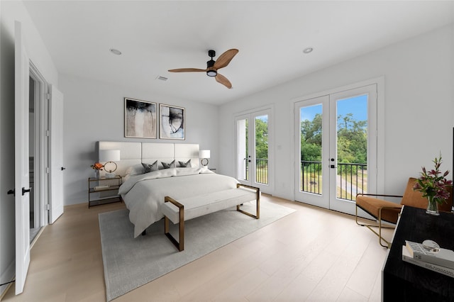 bedroom with access to outside, ceiling fan, french doors, and light hardwood / wood-style flooring