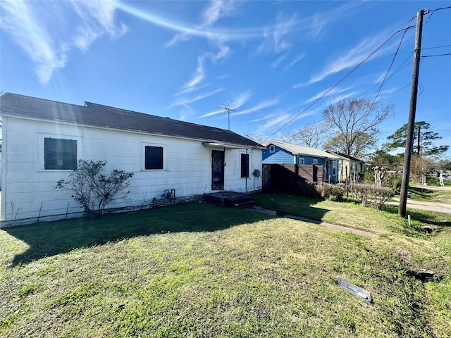 view of front of home with a front yard