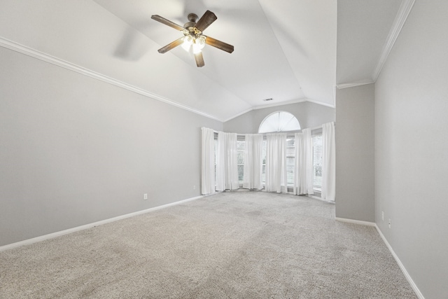 empty room with ceiling fan, crown molding, lofted ceiling, and carpet flooring