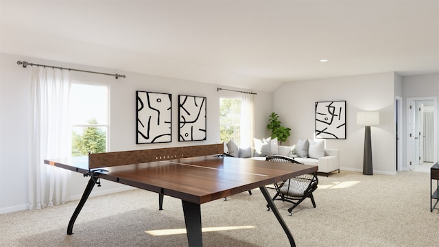 game room with light colored carpet and lofted ceiling