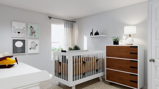 carpeted bedroom featuring a nursery area